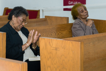 Church members Karen Williams and Vernon Burks at the God Answers Prayer Ministries of Los Angeles on May 3, 2015 (Photo by Heidi de Marco/Kaiser Health News).